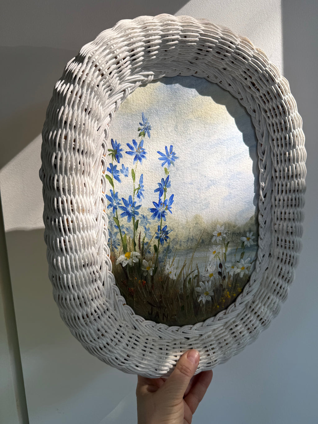 Vintage Woven Wicker Oval Paintings of Wildflower Landscapes, set of 2