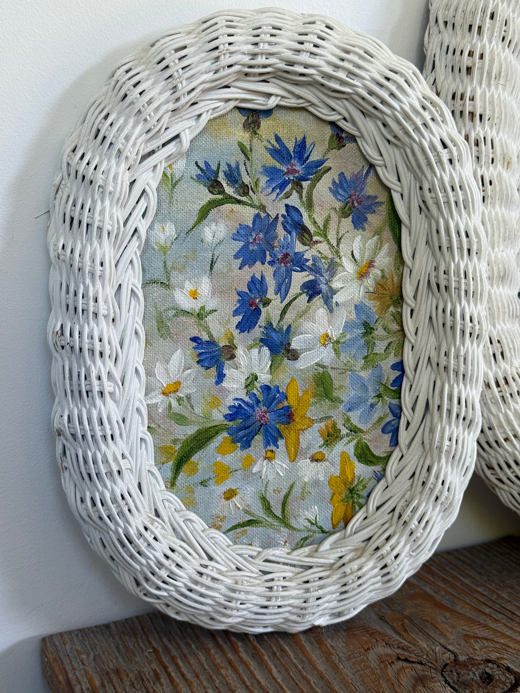 Vintage Woven Wicker Oval Paintings of Wildflower Landscapes, set of 2