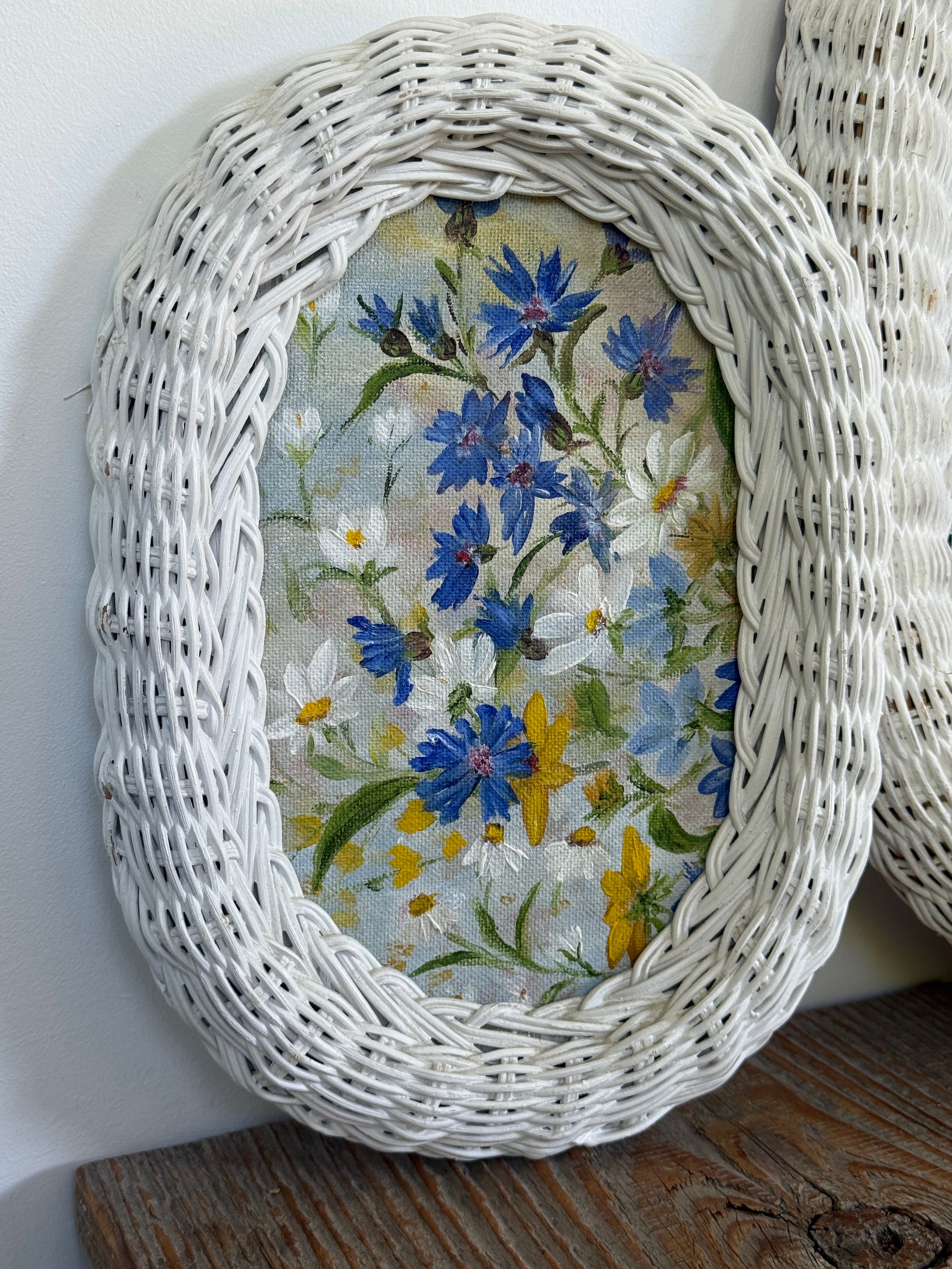 Vintage Woven Wicker Oval Paintings of Wildflower Landscapes, set of 2