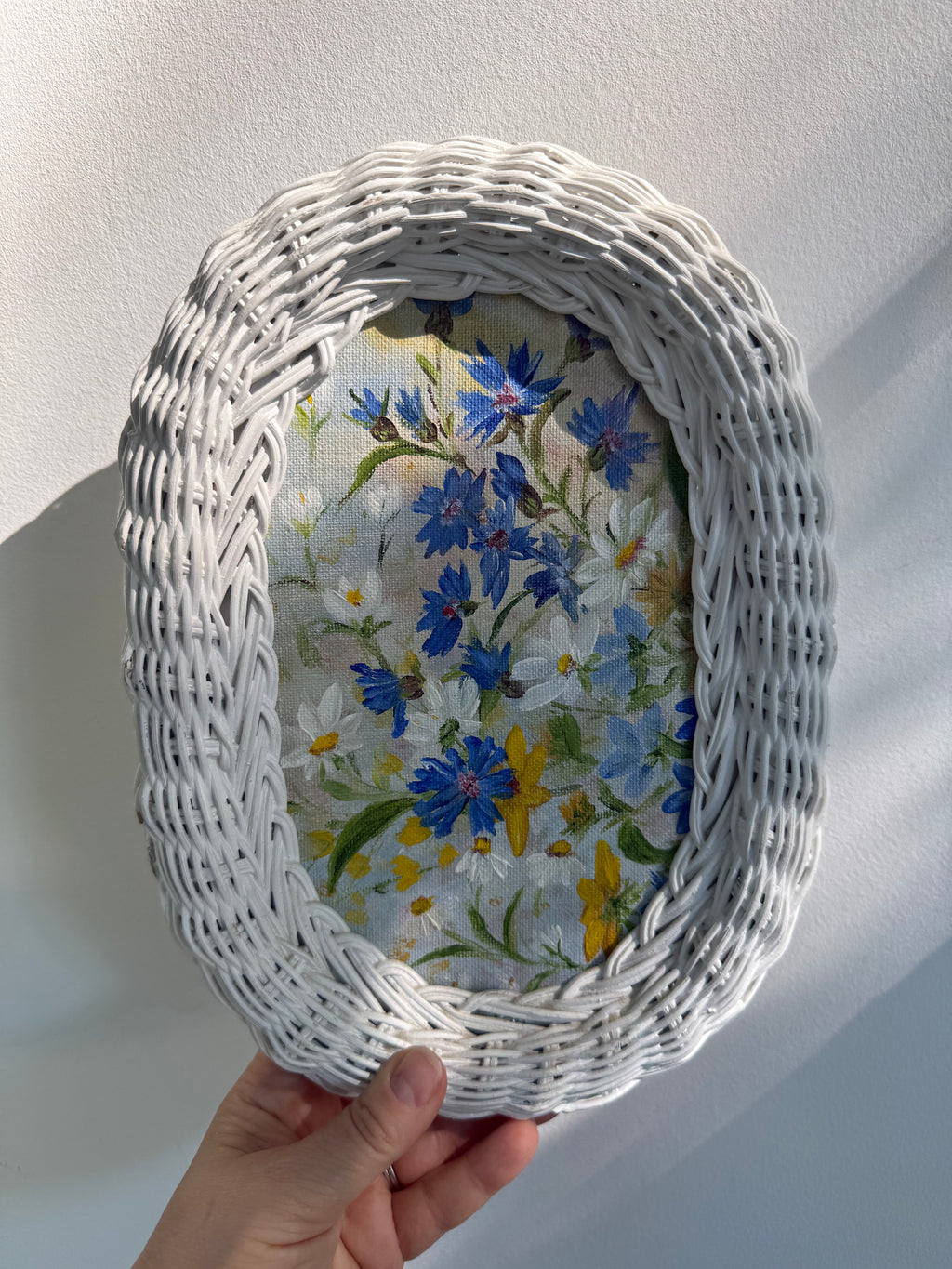 Vintage Woven Wicker Oval Paintings of Wildflower Landscapes, set of 2