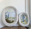 Vintage Woven Wicker Oval Paintings of Wildflower Landscapes, set of 2